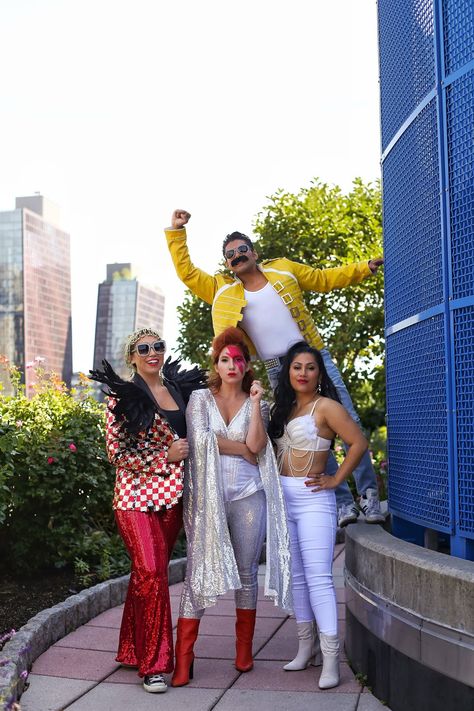 Six Iconic Pop-Culture Halloween Costumes That Will Win You The Best Costume Title This Year , group Halloween costumes, diy group costumes Diy Elton John Costume, 80's Costume Ideas, Freddie Mercury Costume, David Bowie Costume, Elton John Costume, Diy Group Halloween Costumes, Costumes For Work, 80s Birthday, Best Group Halloween Costumes