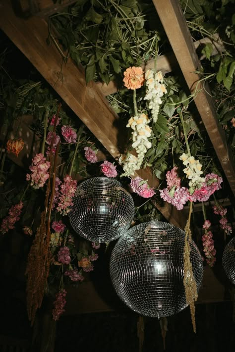 Disco Balls, Mini Dress, and Pizza Trucks: The Perfect Backyard Wedding Disco Floral Installation, Jewel Tone Wedding Aesthetic, Boho Winery Wedding, Outdoor Disco Wedding, Disco Ball At Wedding, Diy Disco Wedding, Whimsical Disco Wedding, Disco Wedding Aesthetic, Disco Ball And Greenery