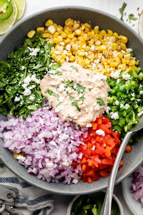 For a lettuce-less salad that hits the spot, Healthy Mexican Street Corn Salad is the perfect recipe. Great for a crowd and made with bell pepper, cotija cheese, and more! Healthy Mexican Street Corn, Cotija Cheese Recipes, Lite Recipes, Street Corn Salad, Mexican Corn Salad, Salads For A Crowd, Mexican Street Corn Salad, Healthy Mexican, Cotija Cheese