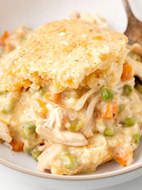 A bowl of this chicken dish with a fork beside it. Chicken Cobbler Recipe, Chicken Cobbler, Creamy Chicken Pot Pie, Chicken Pot Pie Filling, Cooking Chicken To Shred, Cobbler Recipe, Chicken Pot Pie Recipes, Cobbler Recipes, Easy Casserole Recipes