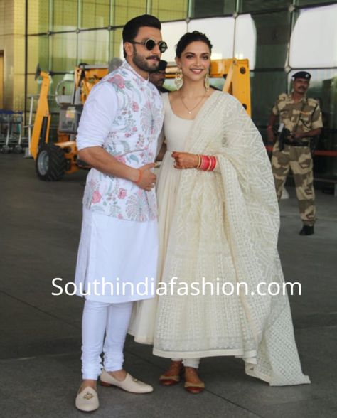 DEEPIKA PADUKONE WHITE ANARKALI AIRPORT White Anarkali Suit Designs, Deepika White Anarkali, Deepika Padukone In Suit, White Anarkali Designs Indian, White Anarkali Kurta Designs, Deepika Padukone Anarkali Suits, Chikenkari Dress Ideas Kurti White, Deepika Padukone White Dress, Anarkali Designs For Wedding