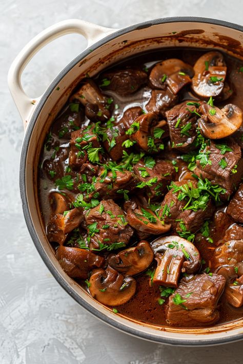 Mouthwatering Keto Dutch Oven Braised Beef and Mushroom Stew Recipe for a Healthy Meal #ketodiet #ketorecipes #lowcarb Keto Beef Mushroom Recipes, Braised Beef And Mushrooms, Beef Stew Healthy Clean Eating, Stew Meat Dutch Oven, Healthy Dutch Oven Recipes Low Carb, Mushroom Beef Recipes, Low Carb Dutch Oven Recipes, Keto Dutch Oven Recipes, Beef With Mushrooms Recipes