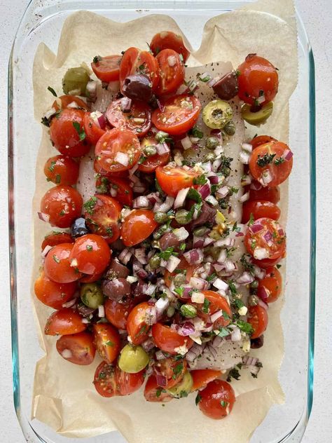 Mediterranean Baked Halibut recipe with tomatoes, olives, capers, lemon, garlic and herbs. Easy recipe for any white fish. Halibut Recipes Baked, Recipe With Tomatoes, Baked Halibut, Halibut Recipe, Lectin Free Recipes, Halibut Recipes, Lectin Free, Red Onion Relish, Vibrate Higher