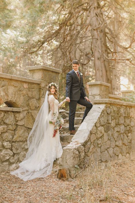 Fairytale wedding in the forest in Lake Arrowhead, California. Bride and groom walking up stone steps of castle ruin in the forest.   #castle #forestwedding #woodsywedding #lakearrowhead Wedding Ruins, Runaway Couple, Engaged Photoshoot, Castle Wedding Dress, Forest Castle, Wedding In The Forest, Lake Arrowhead California, Wedding Scotland, Fairytale Wedding Theme