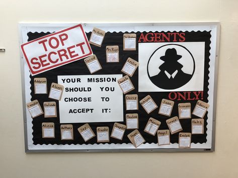 Mission Impossible Bulletin Board with student written goals to begin the school year. Top Secret Bulletin Board, Mission Impossible Bulletin Board Ideas, Mission Possible Bulletin Board, Spy Bulletin Board Ideas, Secret Agent Bulletin Board, Mission Impossible Theme Decorations, Connect Four Bulletin Board, Mission Impossible Crafts, Mission Impossible Party Decorations