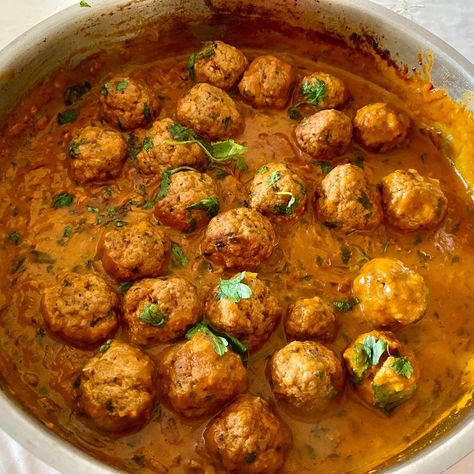 Tender balls of ground meat cooked in a rich creamy coconut curry sauce using East Indian bottle masala. This meatball curry is a surprisingly simple and easy recipe to make but this will soon be a family favorite Meatball Curry Indian, Indian Coconut Curry, Indian Meatballs, Meatball Curry, Creamy Coconut Curry, Curry Meatballs, Indonesian Recipes, Coconut Curry Sauce, Meatball Sauce