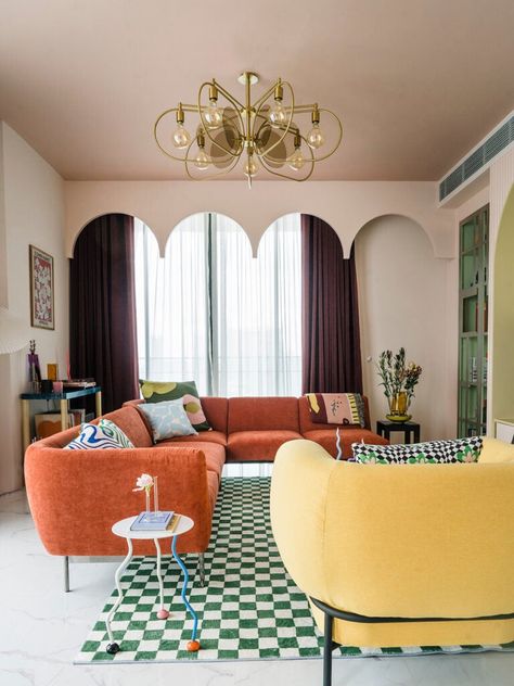 This Arch-Filled Bangkok Apartment Takes Built-In Storage to a New Level | domino Bangkok Interior Design, Bangkok Apartment, Furnitur Ruang Keluarga, Colourful Living Room Decor, Pink Living Room, Colourful Living Room, Living Room Green, Living Room Inspo, Interior Inspo