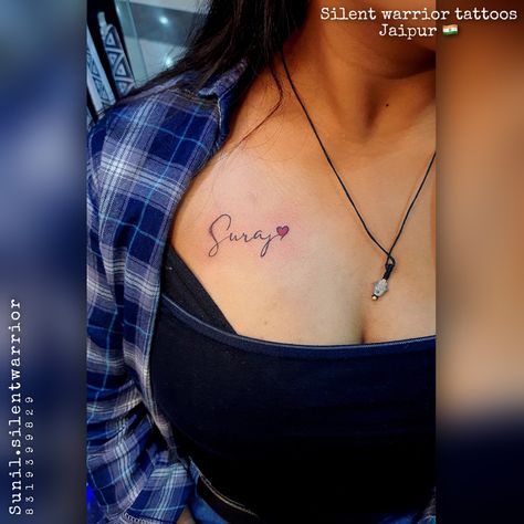 Initial Tattoo On Chest Women, Chest Name Tattoos For Women, Sunil Name Tattoo, Name Tats Tattoo Ideas, Boyfriend Name Tattoos For Women Chest, Husband Name Tattoos For Women Hand, Name On Chest Tattoo Female, Tattoo Near Chest, Name Tattoos For Women Chest