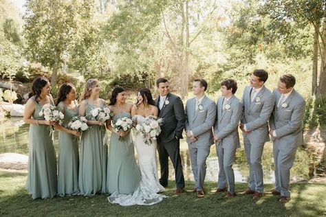 boho summer wedding with sweeping draping, pampas grass, and neutral-colored blooms Bridal Party Sage Green And Grey, Sage Green Bridesmaid Dresses Gray Suits, Sage Green Country Wedding Groomsmen, Sage Green And Grey Bridal Party, Sage Green Gray Wedding, Sage Wedding Theme Groomsmen, Dusty Green Groomsmen Attire, Sage Green And Grey Groomsmen, Eucalyptus Wedding Party Attire