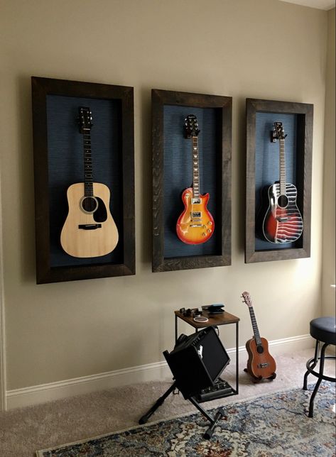 Male Accent Wall, Office Guitar Room, Guitar Area In Bedroom, Storing Guitars At Home, Decorating With Guitars Living Rooms, Guitar Area In House, Living Room With Guitars On Wall, Guitar Room Setup, Guitar Wall Decoration