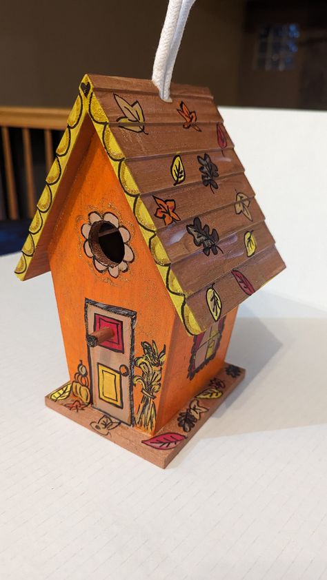 Unique hand-painted birdhouse perfect for Thanksgiving Fall Birdhouse Ideas, Decorated Bird Houses, Birdhouse Designs Paint, Painted Fairy Houses, Birdhouse Painting Ideas Easy, Birdhouse Painting Ideas, Birdhouses Painted, Birdhouse Painting, Halloween Birdhouse