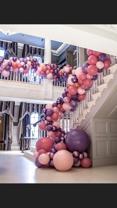 Balloon garland staircase Ballon Garland Staircase, Balloon Stairs Decoration, Balloon Arch On Staircase, Balloons Staircase, Balcony Balloon Garland, Balloon Garland On Staircase, Stairs Balloon Garland, Stair Case Balloon Decor, Balloons On Staircase