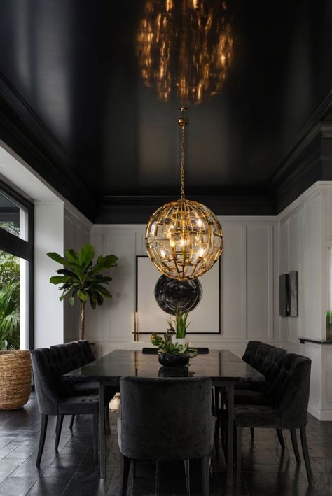 Black Ceiling Chic: 16 Designs to Inspire Your Bold Choice! (Plus Tips) - upgradesign.blog Black Ceiling And Floor, Black Luxury Dining Room, Low Ceiling Dining Room Ideas, Dining Room With Black Floors, High Gloss Black Ceiling, Cool Color Interior Design, Award Winning Interior Design, Dining Room Accent Ceiling, Black Ceiling Interior