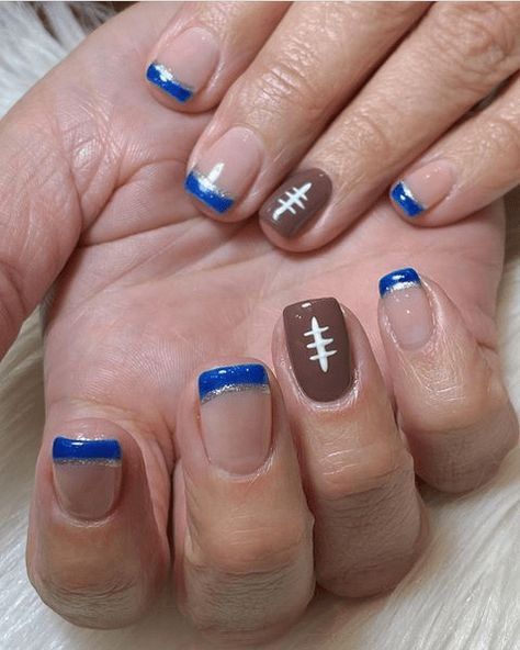 2024's Trendiest Football Nail Designs - Show Your Team Spirit in Style Nail Ideas Football, Team Nails Sports, Football Nail Designs Nfl, Nails For Football Season, Football Season Nail Designs, Blue And Gold Football Nails, Cute Football Nails, Fall Football Nail Designs, Cheerleader Nails Designs