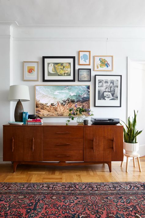 Living Room With Credenza, Mid Century Modern Living Room Gallery Wall, Art Over Couch Living Rooms, Dark Cozy Bedroom Ideas, Living Room Credenza, Dark Cozy Bedroom, Mcm Living, Family Friendly Living Room, Credenza Decor