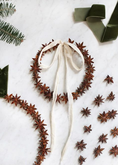 Learn how to quickly make one of these festive star anise wreaths with just a few materials! #christmas #diywreath Material Christmas Decorations, Crafts With Star Anise, Vintage Christmas Decorations Diy Crafts, Star Anise Christmas Ornaments, Star Anise Ornaments, Star Anise Wreath Diy, Star Anise Decorations, Star Anise Christmas Decoration, Star Anise Garland