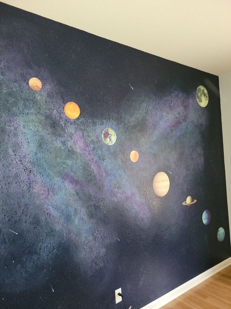 Created a galaxy wall for the kids bedroom by painting and blending and then finishing off with planet decals Space Wall Painting Bedroom, Diy Space Painting, Galaxy Wall Paint, Supernova Painting, Planet Mural, Outer Space Mural, Space Wall Painting, Astronomy Room, Galaxy Wall Mural