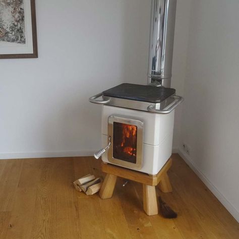 Narrow Wood Stove, Tiny House Wood Burning Stove, Grizzly Cubic Mini Wood Stove, Soapstone Stoves Wood Burning, She Shed With Wood Stove, Wood Stove Surround Wall, Wood Stove Makeover, Modern Wood Stove, Small Wood Stoves