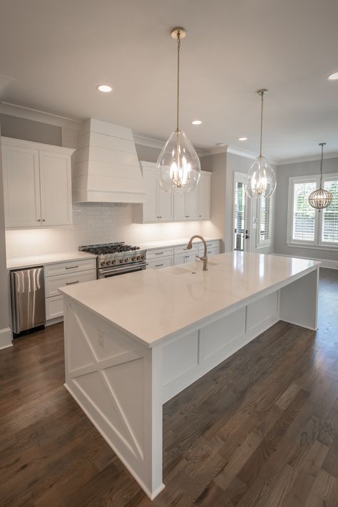 Pristine white kitchen with brass hardware and finishes Modern Kitchen Design White Shaker Cabinets, Kitchen Small White Cabinets, Farmhouse Kitchen Island White, Kitchen Interior Gold And White, White Countertops White Cabinets Kitchen, White And Bright Kitchen, White Kitchen Gold Hardware Stainless Steel Appliances, Modern White Kitchen Design With Island, All White Shaker Kitchen