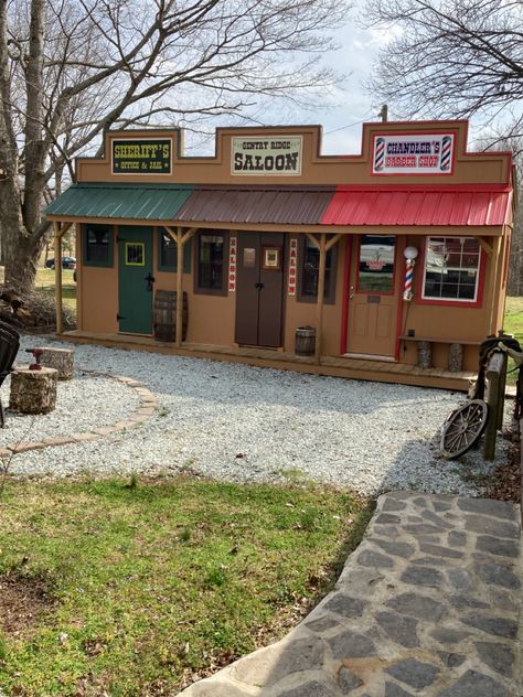 Western Town Jail/Saloon/Barber Shop Old West Town Privacy Fence, Western Facade Design, Western Barber Shop, Old Western Town Store Fronts, Western Town Buildings, Saloon Interiors Ideas, Western Backyard, Western Facade, Shed Exterior Ideas