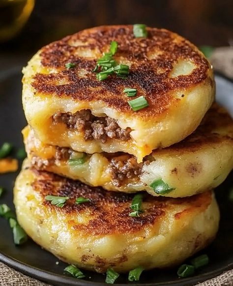 Quick & Easy Stuffed Potato Cakes | Stuffed Potato Cakes Recipe, Stuffed Potato Pancakes With Ground Beef, Stuffed Potato Patties, Stuffed Mashed Potatoes Recipes, Layered Fried Potatoes, Beef Stuffed Potato Cakes, Cheese Filled Potato Cakes, Crispy Mashed Potato Cakes, Fried Leftover Mashed Potatoes