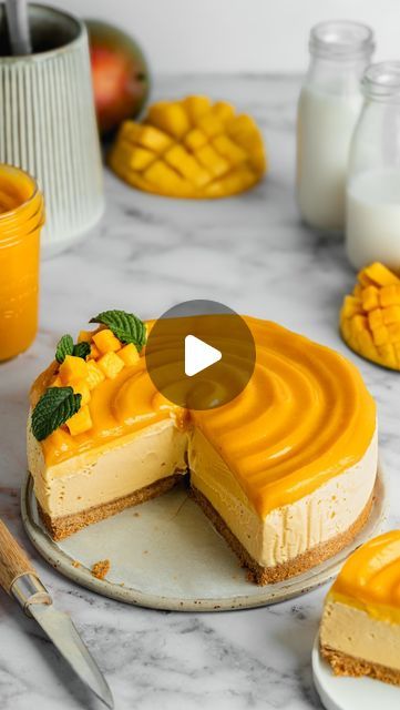 Christina | Vegan Recipes on Instagram: "This easy vegan mango cheesecake has layers of no-bake cookie crust, mango cream cheese filling and lush mango curd topping. The filling is also flavored with homemade mango curd, which gives a tonne of mango flavor without the added water content coming from fresh fruit or purée. This is up there with my favourite ever cheesecakes, I hope you give it a try! 

Comment MANGO CHEESECAKE below and I’ll ans the full recipe to you directly. Or head to my website to get it. Enjoy 🥭 

#vegancheesecake #nobake" Vegan Mango Cheesecake, Mango Curd, Mango Cheesecake, Mango Cream, Mango Flavor, Cookie Crust, Cream Cheese Filling, No Bake Cookies, Cheesecake Recipes