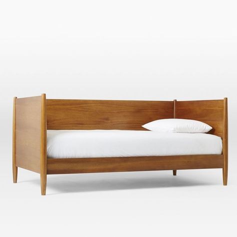 Simple and sophisticated. The Mid-Century Daybed brings 50s and 60s style to guest rooms or living rooms. With its streamlined silhouette and gently tapere Kids Daybed, Mid Century Daybeds, Reclaimed Wood Beds, Modern Upholstered Beds, Mid Century Bed, Wooden Daybed, Mid Century Nightstand, Contemporary Bed, Upholstered Storage