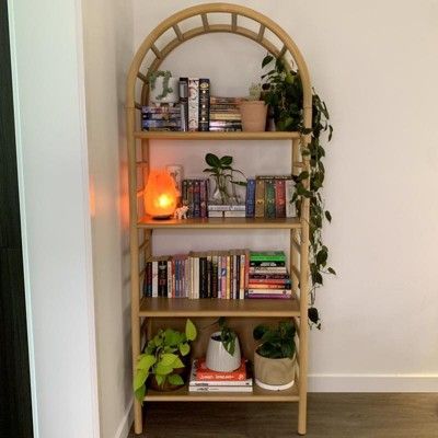 A curved wooden shelf is a versatile add-on to small spaces. The arching ladder detail gives this bookshelf an airy look to store & display without looking bulky. Curved Wooden Bookcase, Arched Bookcases, Arched Bookshelf, Decorative Storage Bins, Bookshelf Organization, Family Photo Frames, Wooden Bookcase, Wooden Shelf, Art Desk