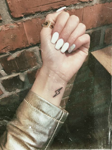 Lightning Bolt Wrist Tattoo, Small Lightning Bolt Tattoo, Tattoo Lightning, Lightning Bolt Tattoo, Lightning Tattoo, Bolt Tattoo, Small Meaningful Tattoos, Greek Tattoos, Jewelry Tattoo