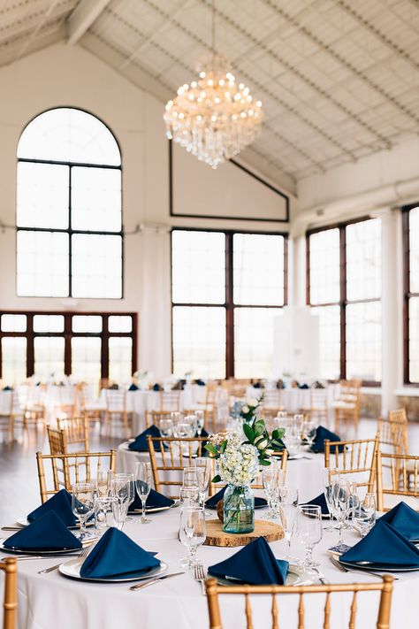 Beautiful navy blue wedding table setting perfect for fall weddings. | Image by TLIC Media | Wedding Photography & Videography Navy And Cream Wedding Colors, Navy Blue White And Tan Wedding, Navy Light Blue And Gold Wedding, Navy Blue Table Decorations, Blue Navy Wedding Theme, Wedding Navy Decorations, Midnight Navy Wedding, Navy Blue Table Settings Wedding, Navy And Gold Wedding Decorations