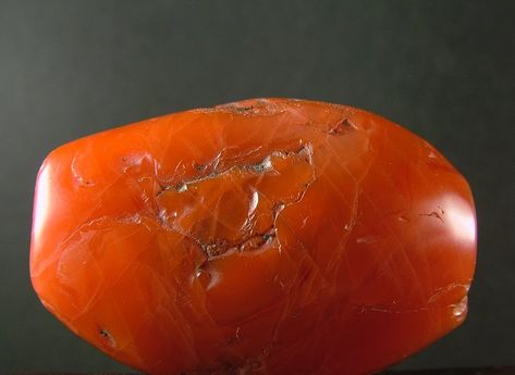 An antique Pema Raka carnelian bead. The Tibetan name Pema Raka originates from the sanskrit words Padma meaning Lotus flower and... Red Lotus, Sanskrit Words, Carnelian Beads, Evil Spirits, Sanskrit, Himalayan, Lotus Flower, Deep Red, Lotus