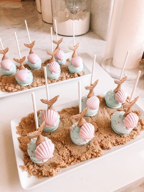 Mermaid Cake pops mermaid themed birthday party dessert 3rd Birthday Party Mermaid, 2nd Mermaid Birthday Party, Mermaid Theme Cake Pops, Mermaid Theme 2nd Birthday Party, Mermaid Birthday Party Desserts, Mermaid Cake Balls, 6th Mermaid Birthday Party, Mermaid Birthday Dessert Table, Cake Pop Mermaid