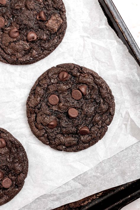 Indulge in these deliciously rich and decadent double chocolate chip cookies. These cookies are made without eggs so they're perfect for anyone with dietary restrictions too! These cookies are packed with gooey chocolate chips and lots of cocoa powder. Get the recipe here! Eggless Double Chocolate Chip Cookies, Chocolate Chip Cookies Egg Free, Easy Dessert Without Eggs, Baked Goods Without Eggs, Chocolate Chip Cookies No Eggs Recipes, Eggless Christmas Cookies Recipes, Chocolate Chip Cookies Recipe No Egg, Eggless Baked Goods, Chocolate Cookies Eggless