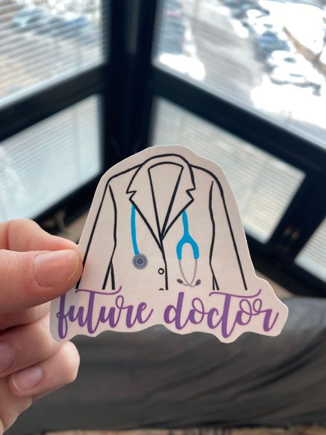 Keep yourself motivated on your premed track with this future doctor sticker! Perfect for any water bottles, computers, etc. Handmade and hand designed!! Dream Doctor Drawing, Doctor Stuff, Doctor To Be, White Coat Quotes, Quotes For Future Doctors, Doctor Coat Aesthetic, Doctor Motivation Aesthetic, Study Stickers Aesthetic, Future Doctor Wallpaper Medical