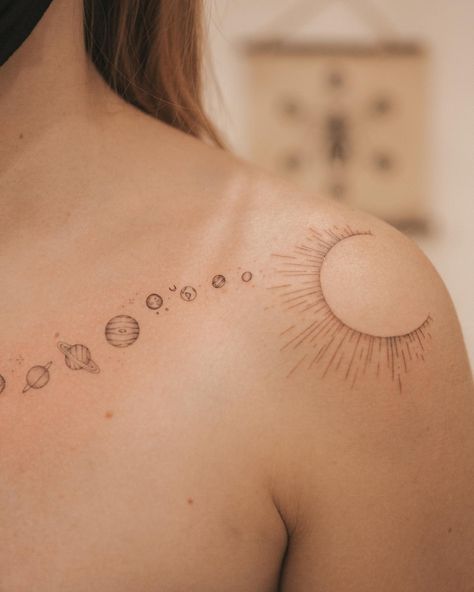 Celestial Ink: 30 Creative Solar System Tattoo Ideas You’ll Love 9 Solar System Geometric Tattoo, Planet Orbit Tattoo, Abstract Celestial Tattoo, Fine Line Space Tattoo, Small Space Tattoo Ideas, Celestial Tattoos For Women, Minimalist Space Tattoo, Astronomy Tattoo Ideas, Orbit Tattoo