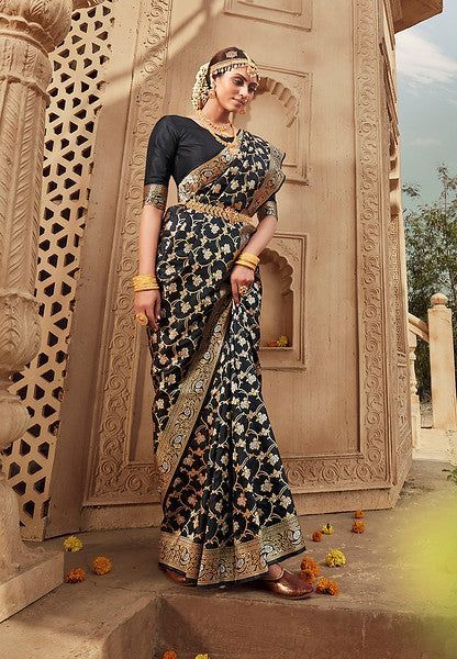 "Buy authentic Black Color Banarasi silk online. Only at the official store of India @YellowFashion can you find stunning traditional wedding and Bridal Banarasi sarees in a variety of colors, patterns, and designs at the best price. For a limited time only, there is a grand sale with free shipping throughout India." Sarees Black, Kanjeevaram Sarees, Latest Designer Sarees, Banarasi Silk Saree, Black Saree, Designer Sarees Online, Casual Saree, Art Silk Sarees, Silk Sarees Online