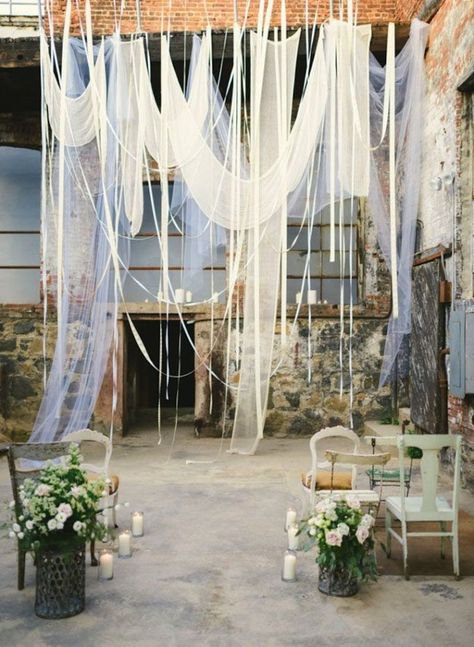 Drapery Ideas to Stun Your Wedding Guests  | OneWed Loft Wedding Decor, Industrial Loft Wedding, Loft Wedding Ceremony, Ceremony Backdrop Indoor, Neutral Wedding Inspiration, Industrial Wedding Decor, Industrial Wedding Venues, Loft Wedding, Warehouse Wedding