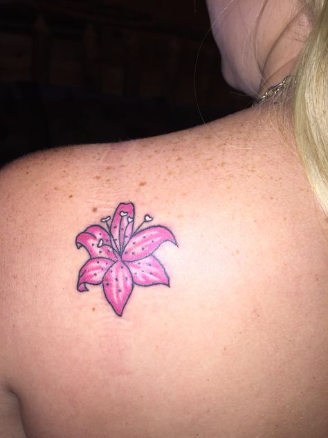 Great for first ink. Lily tattoo. Small and cute. Pink. Small Lilly Tattoo, Lilly Tattoos, Small Shoulder Tattoo, Small Lily Tattoo, Stargazer Lily Tattoo, Serenity Tattoo, Skull Thigh Tattoos, Tiger Lily Tattoos, Lily Tattoos