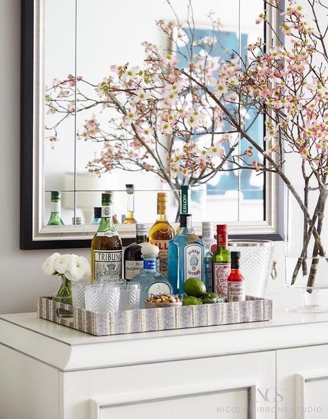 Now don’t get me wrong – I love a good bar cart setup. In fact, I had one in my last apartment. They’re a practical, functional solution to a small space and they’re pretty … Bar Tray Styling, Sophisticated Apartment, Console Decor, Bandeja Bar, Gold Bar Cart, Bar Sala, Home Bar Design, Bar Tray, Bar Inspiration