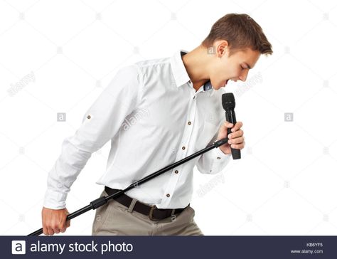 Young man singing into a microphone isolated on white background Stock Photo Microphone Drawing, Man Singing, People Poses, White Background Photo, Body Poses, Drawing Practice, Pose Reference Photo, Art Poses, Drawing Reference Poses