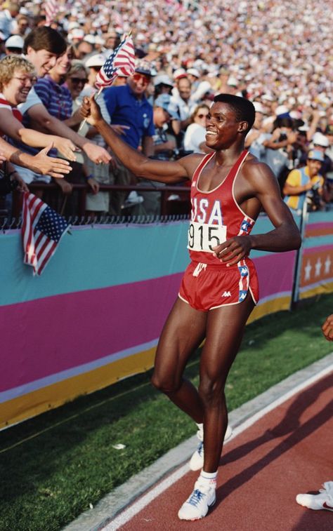 Inspirational Moments: Olympic celebrations - LOS ANGELES, CA - AUG 6 1984: Carl Lewis of the USA celebrates his gold medal win in the Long Jump final during the 1984 Olympic Games. Lewis won the gold medal with a jump of 8. 54 metres at the Colliseum Stadium on August 6, 1984 in Los Angeles. (Photo by Tony Duffy / Getty Images ) Mark Spitz, Carl Lewis, Field Athletes, 1984 Olympics, Sport Nutrition, Long Jump, Olympic Athletes, Sports Stars, Summer Olympics