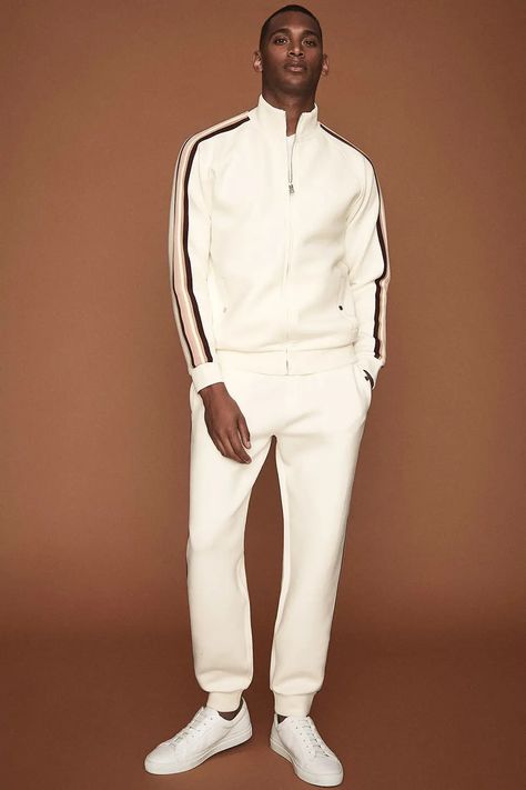 Top 10 All-White Outfits For Men: Fresh Looks For Summer 2022 White Tracksuit Outfit, Tracksuit Outfit Mens, Looks For Summer, White Outfit For Men, Sporty Outfits Men, Tracksuits For Men, White Tracksuit, Athleisure Men, Smart Casual Dress