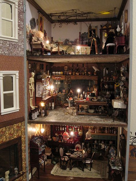 Witch Dollhouse ~ although if I had done it, I might have switched the 2nd & 3rd floors.  Workroom out of casual sight. Witch Dollhouse, Haunted Dollhouse, Halloween Miniatures, Haunted Dolls, Miniature Rooms, Tiny World, Witch House, Miniature Houses, Miniature House