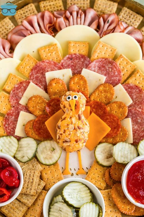 Thanksgiving charcuterie board with a cheesewball shaped like a turkey. Thanks Giving Charcuterie Board, Turkey Cheese Ball, Thanksgiving Charcuterie Board, Baked Chicken Cordon Bleu, Thanksgiving Veggies, Thanksgiving Charcuterie, Cheese And Cracker Tray, Christmas Sugar Cookie Recipe, Friendsgiving Dinner Party