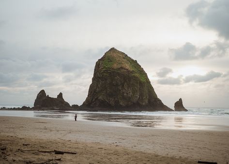 This epic photo of Haystack Rock in Cannon Beach, Oregon is for sale on my website. Oregon Cannon Beach, Cannon Beach Tattoo, Oregon Coast Aesthetic, Haystack Rock Oregon, Oregon Bucket List, Multnomah Falls Lodge, Oregon Forest, Haystack Rock, Smith Rock State Park