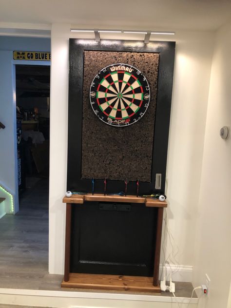 Dart Board Area Ideas, Dart Board Set Up, Indoor Dart Board Wall, Modern Dart Board Wall, Hidden Dart Board Ideas, Dart Room Ideas, Electronic Dart Board Cabinet, Dart Board Ideas, Dart Board Wall Ideas