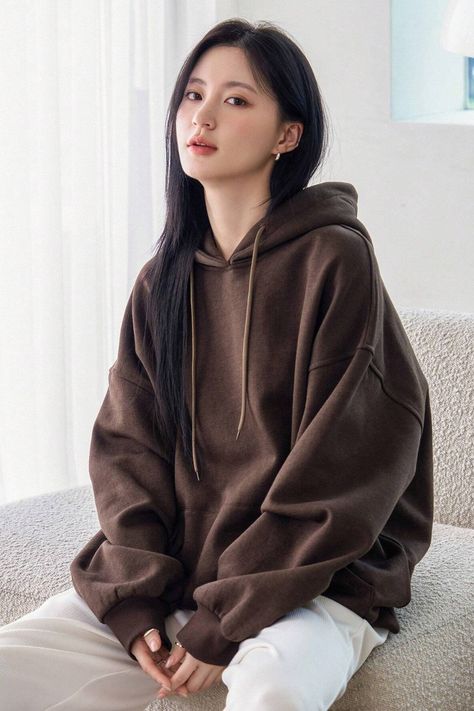 This Women's Oversized Brown Drawstring Hoodie is perfect for keeping you warm on a cold day. The comfortable and soft fabric is perfect for year-round wear. #women #hoodie #oversized #koreanfashion Jacket Over Hoodie Outfit, Brown Hoodie Outfit, Hoodie Jacket Outfit, Cute Hoodie Outfit, Classy Trousers, Dope Fashion Outfits, Baggy Hoodie, Brown Sweatshirt, Plain Sweatshirt