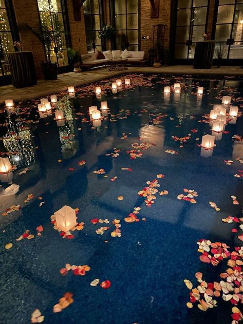 Pool Party Decorations Night Time, Pool Filled With Flowers, Wedding With Pool Backyard, Pool Decorations For Engagement Party, Pool At A Wedding, Wedding Pool Floating Decorations, Wedding Pool Lanterns, Candles In Pool Wedding, Wedding On Water Ideas