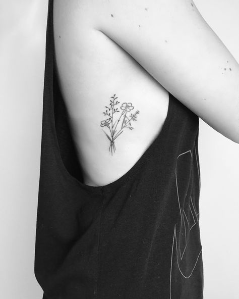 Small minimalist wildflower tattoo with fine black lines and detailing. Flower tattoo, black tattoo, feminine tattoo, floral tattoo Wildflowers Tattoo, Sunflower Tattoo Shoulder, Permanente Make-up, Wildflower Tattoo, Muster Tattoos, Small Flower Tattoos, Initial Tattoo, Sunflower Tattoos, Arm Tattoos For Women