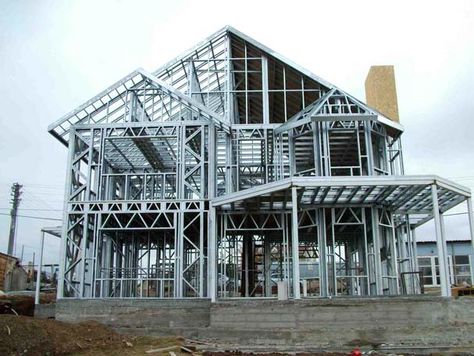 Resourceful online magazine covering metal building homes, steel frame houses, prefab kits and barndominiums. Explore home ideas, guides & find answers! Metal Buildings With Living Quarters, Metal Shop Building, Pre Engineered Buildings, Steel Barns, Steel Structure Buildings, Steel Frame House, Steel Framing, Free House Plans, Steel Frame Construction